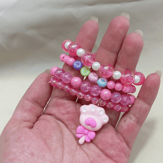 Pulseira de Miçanga com Patinha - Cor Rosa